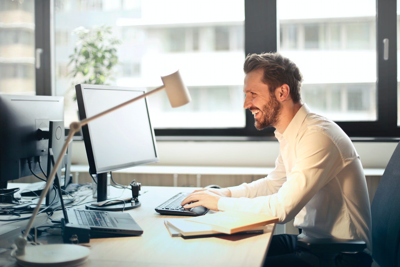 man looking through email
